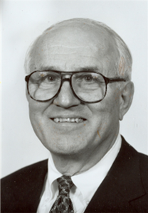 A headshot of Mr. George C. Alex